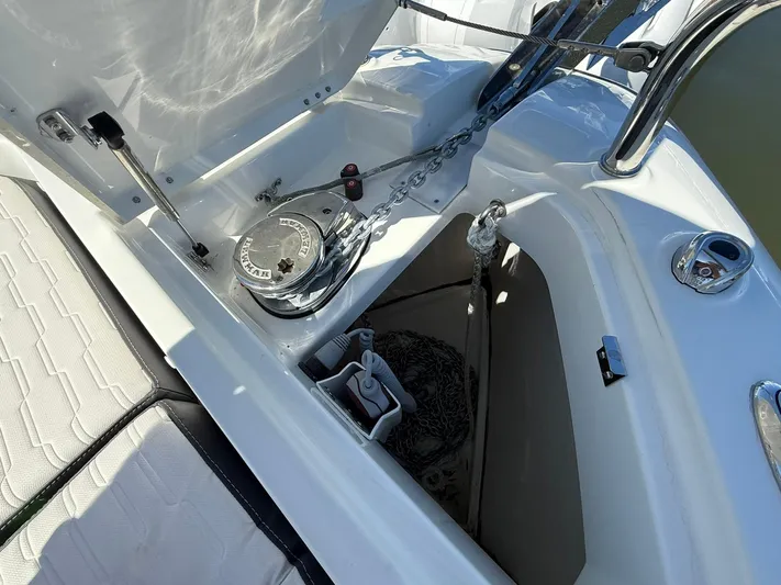  Yacht Photos Pics 2023 Wellcraft 38 Explorer boat anchor compartment with winch and chain storage.