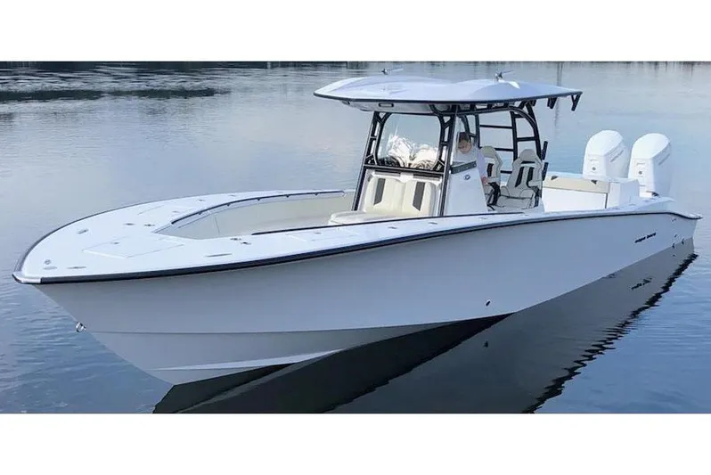  Yacht Photos Pics Manufacturer Provided Image: 2026 Cape Horn 39 T boat on calm water, featuring sleek design and twin engines.