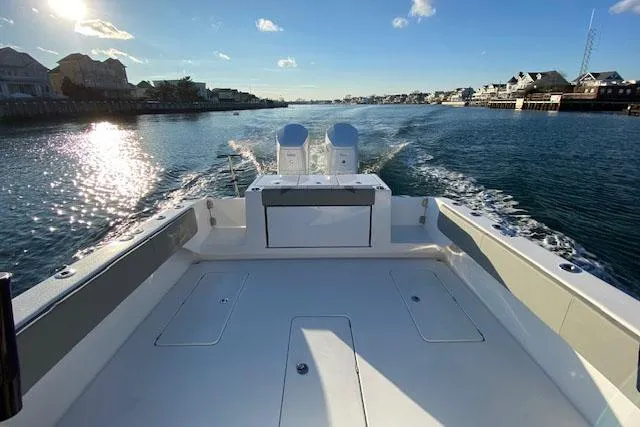  Yacht Photos Pics Manufacturer Provided Image: 2026 Cape Horn 39 T boat cruising on a sunny waterway with scenic coastal views.