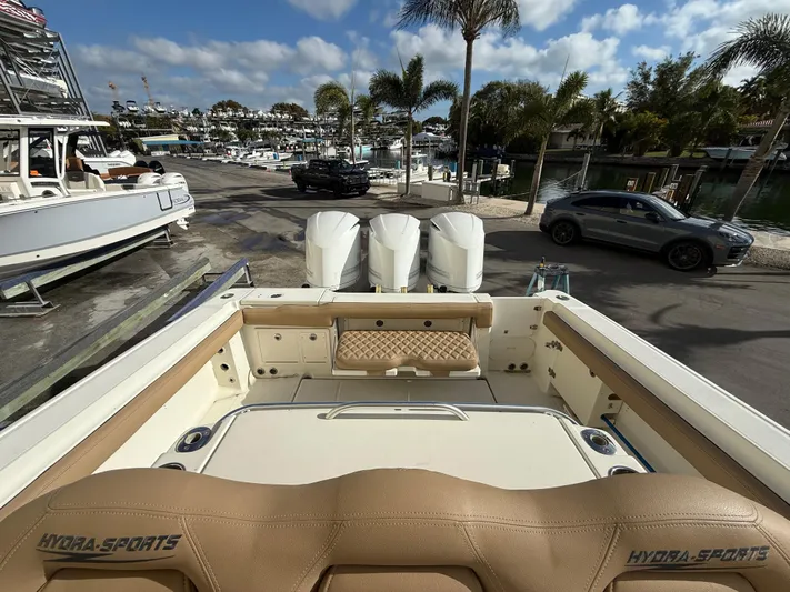 Yacht Photos Pics 2006 Hydra-Sports Vector 3300 CC boat with triple engines docked at marina.