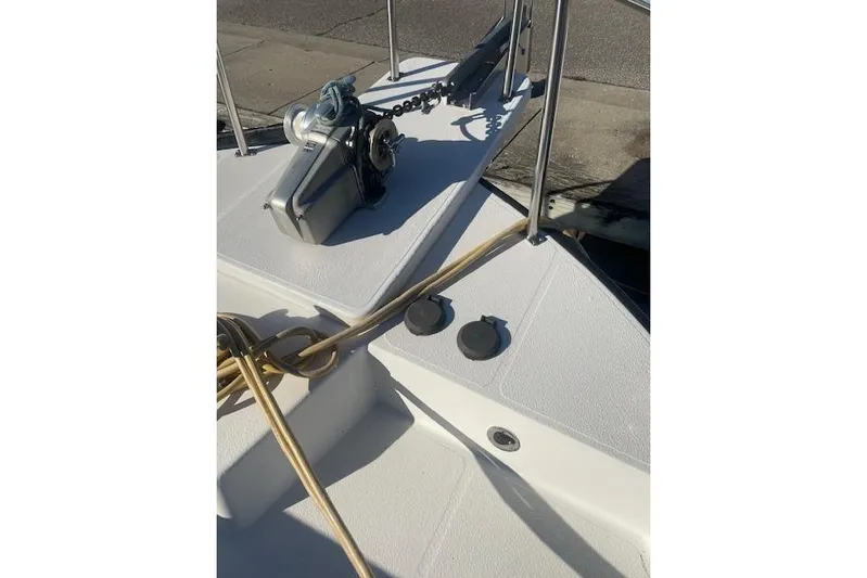  Yacht Photos Pics Nordic Tug 42 (2006) bow with anchor winch and ropes on deck.