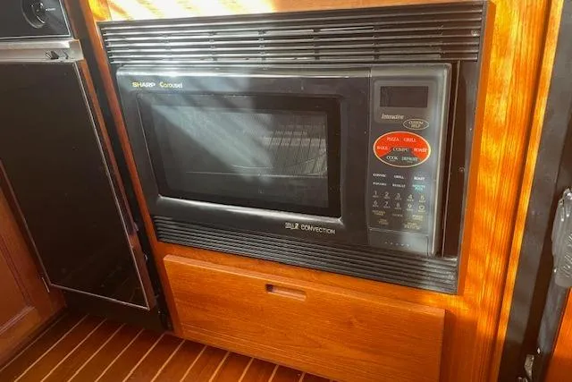  Yacht Photos Pics Sharp Convection microwave in 2006 Nordic Tug 42 boat interior.
