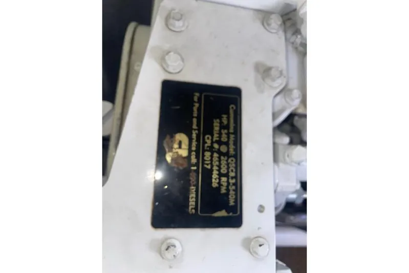  Yacht Photos Pics Engine label on 2006 Nordic Tug 42, displaying model and specifications.