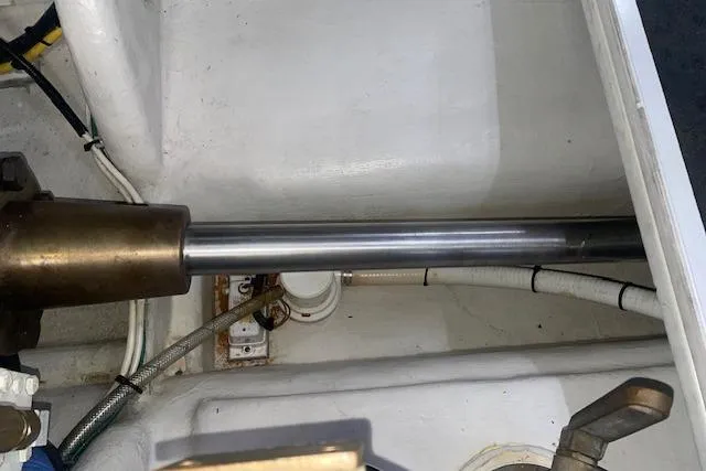  Yacht Photos Pics Engine compartment of a 2006 Nordic Tug 42, showing mechanical components and wiring.