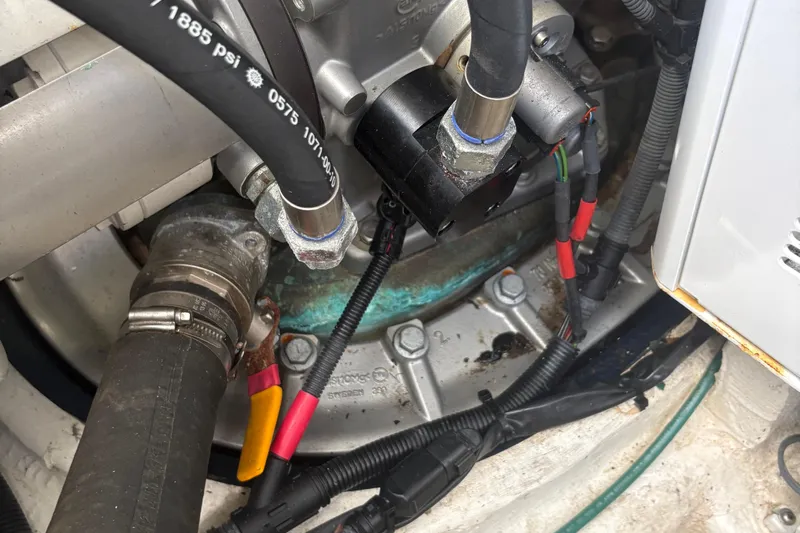  Yacht Photos Pics Engine compartment of a 2016 Sabre 38 Salon Express with visible hoses and wiring.