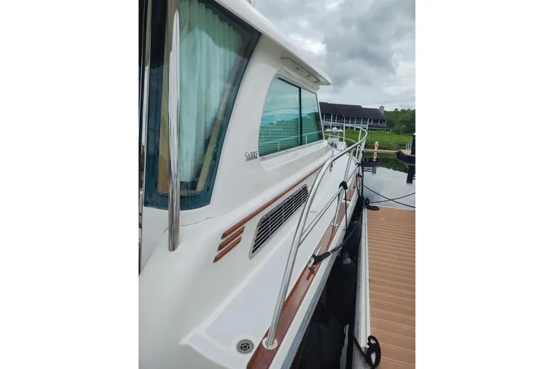  Yacht Photos Pics 2016 Sabre 38 Salon Express yacht docked, showcasing sleek design and polished exterior.