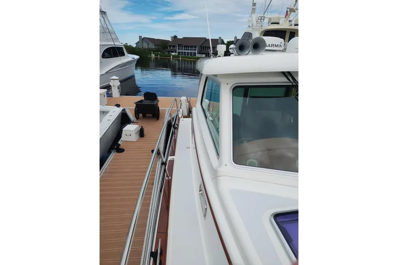  Yacht Photos Pics 2016 Sabre 38 Salon Express docked, showcasing sleek design and waterfront view.
