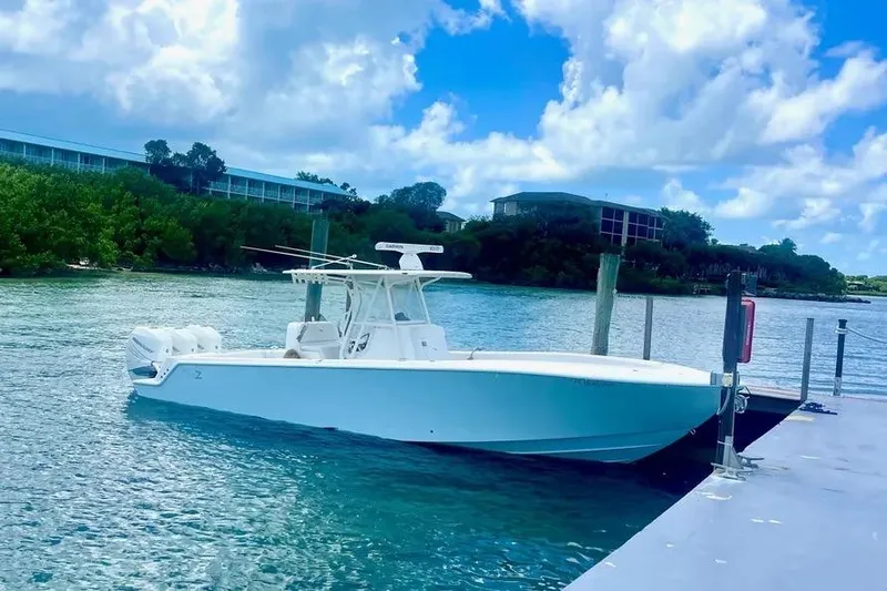 Yacht Photos Pics 2018 SeaVee 340Z boat docked on a sunny day with blue skies.