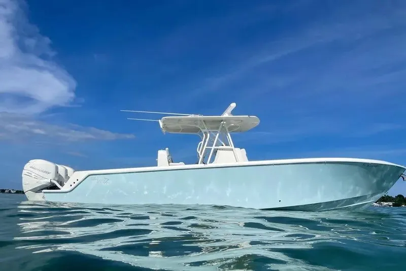  Yacht Photos Pics 2018 SeaVee 340Z boat on calm water under clear blue sky.