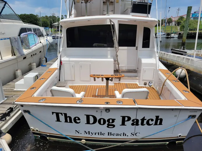 The Dog Patch Yacht Photos Pics 1990 Ocean Yachts 48 Super Sport docked, named "The Dog Patch," in North Myrtle Beach, SC.