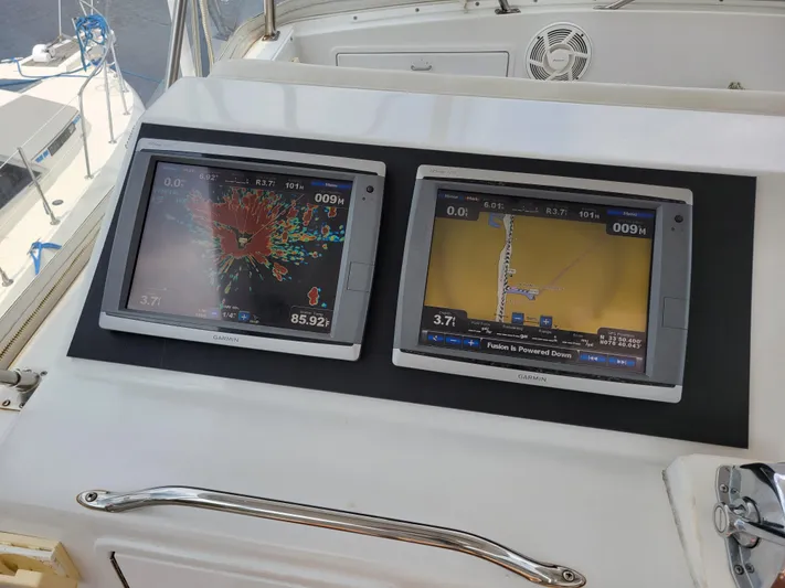 The Dog Patch Yacht Photos Pics Garmin navigation screens on a 1990 Ocean Yachts 48 Super Sport boat.