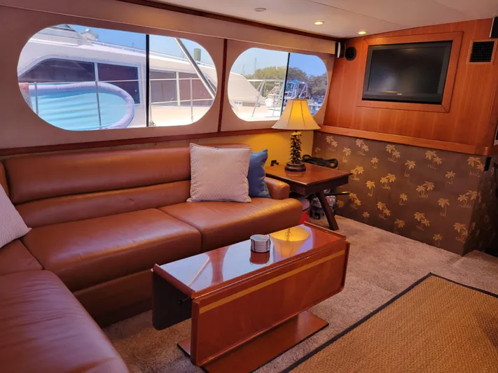 The Dog Patch Yacht Photos Pics Luxurious interior of 1990 Ocean Yachts 48 Super Sport with leather seating and elegant decor.