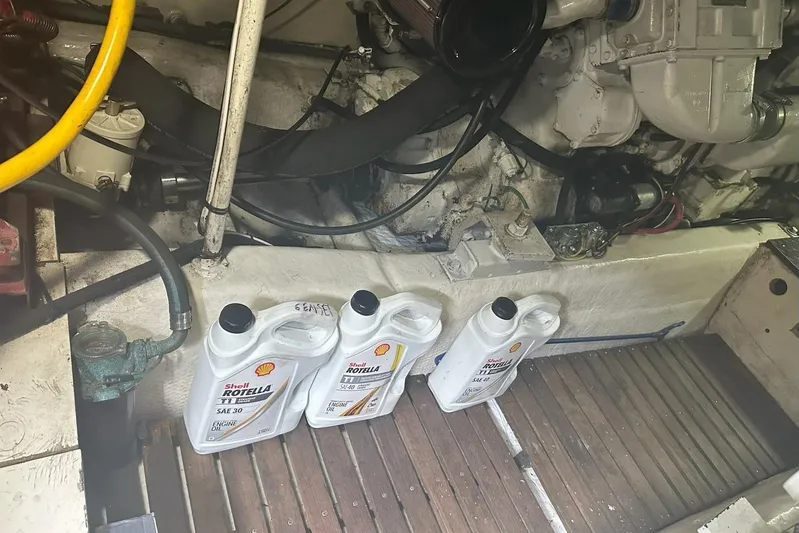 The Dog Patch Yacht Photos Pics Engine room of 1990 Ocean Yachts 48 Super Sport with Shell Rotella oil containers.