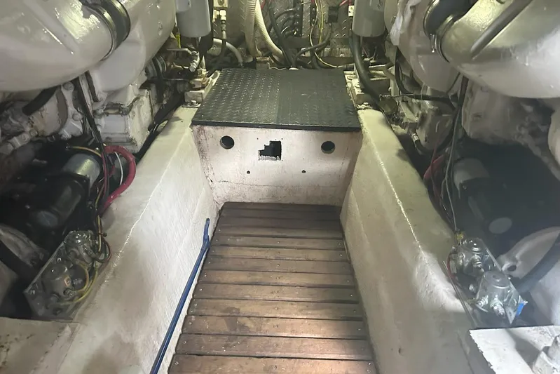 The Dog Patch Yacht Photos Pics Engine room of 1990 Ocean Yachts 48 Super Sport with visible machinery and components.