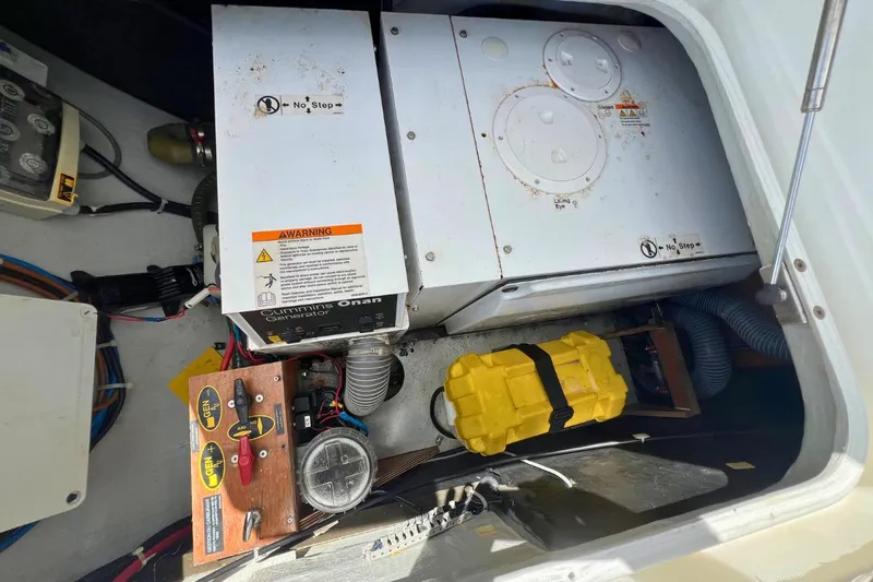 Take It Easy Yacht Photos Pics Engine compartment of 2018 Lagoon 450 F with Cummins Onan generator and wiring.