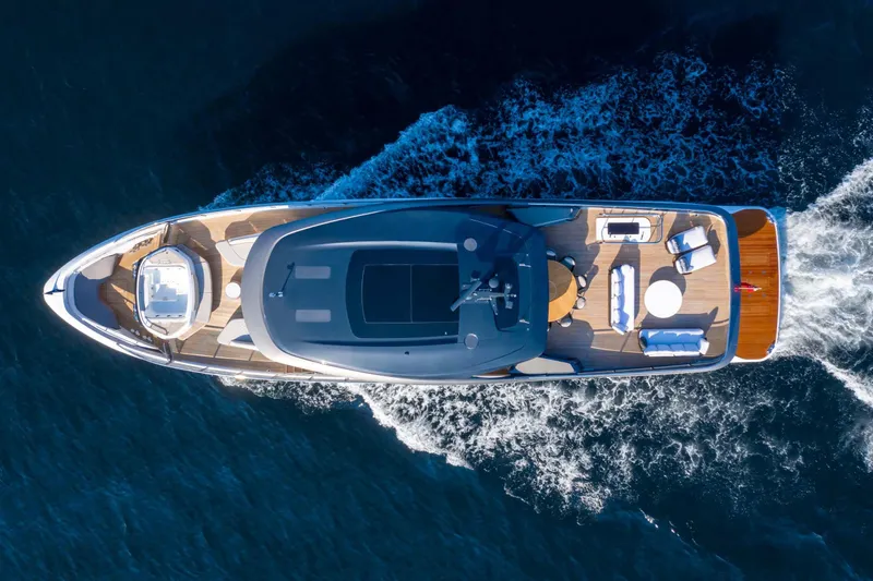  Yacht Photos Pics Aerial view of 2025 Princess X95 yacht cruising on open water.
