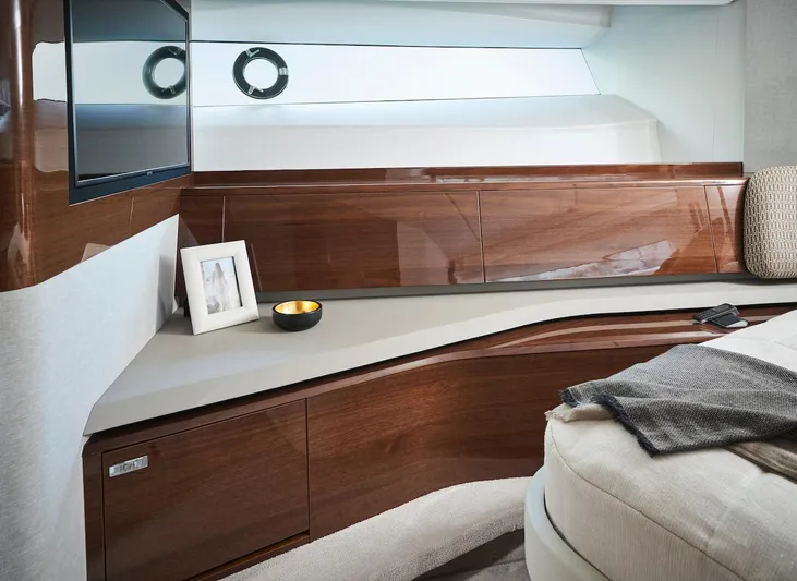  Yacht Photos Pics Luxurious interior of 2025 Princess X95 yacht with sleek wood finish and modern decor.