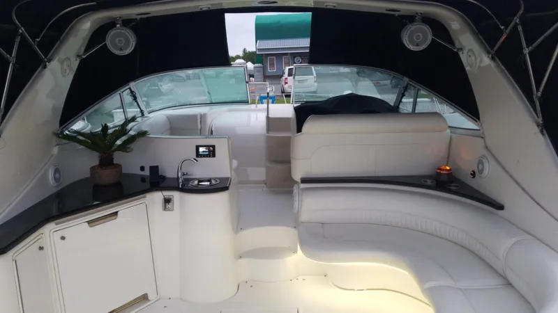  Yacht Photos Pics Interior of 2000 Cruisers 3870 Express yacht with white seating and modern amenities.