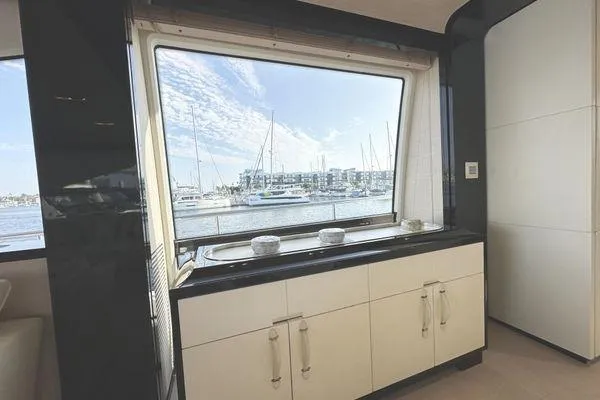  Yacht Photos Pics Interior view of 2015 Azimut 80 yacht kitchen with marina view.