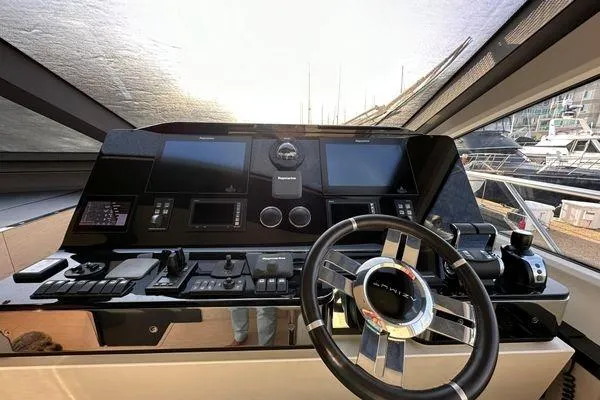  Yacht Photos Pics Cockpit of 2015 Azimut 80 yacht with modern navigation controls and steering wheel.