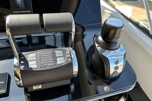  Yacht Photos Pics Control panel of a 2015 Azimut 80 yacht with throttle and joystick.