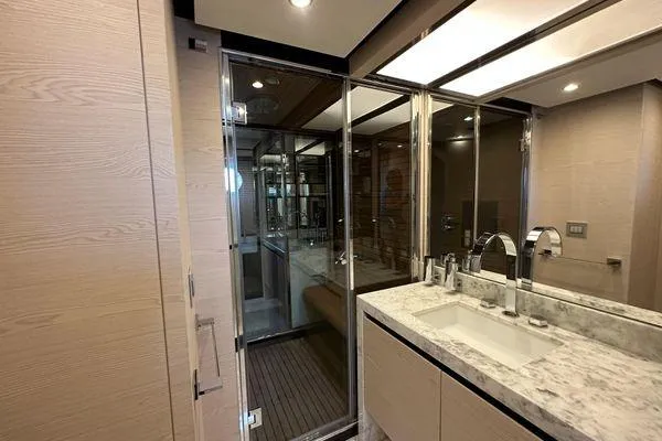  Yacht Photos Pics Luxurious bathroom interior on a 2015 Azimut 80 yacht, featuring modern fixtures and elegant design.