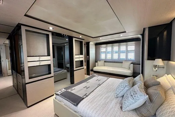  Yacht Photos Pics Luxurious bedroom interior of 2015 Azimut 80 yacht with modern design and elegant furnishings.