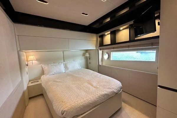  Yacht Photos Pics Luxurious bedroom interior of 2015 Azimut 80 yacht with modern design and ocean view.