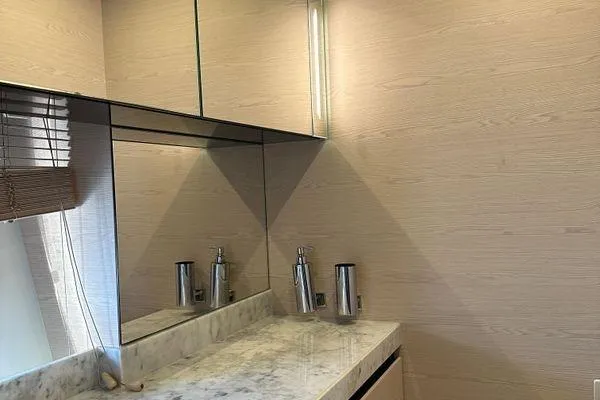  Yacht Photos Pics Luxurious bathroom interior on 2015 Azimut 80 yacht with marble countertop and mirrored cabinets.