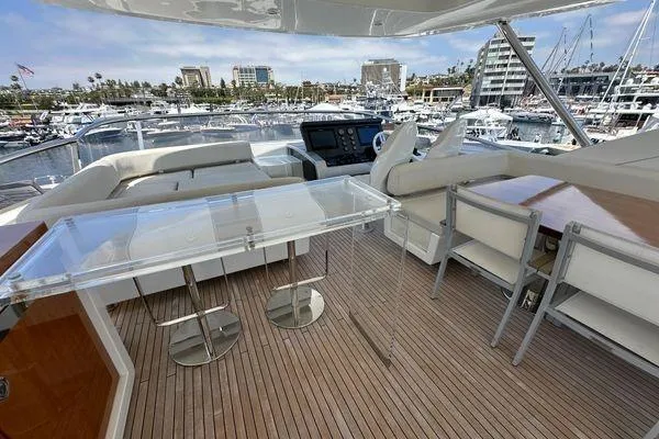  Yacht Photos Pics Luxurious 2015 Azimut 80 yacht deck with modern seating and marina view.