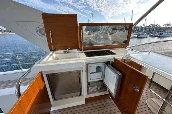  Yacht Photos Pics Outdoor kitchen on 2015 Azimut 80 yacht with sink, grill, and fridge.