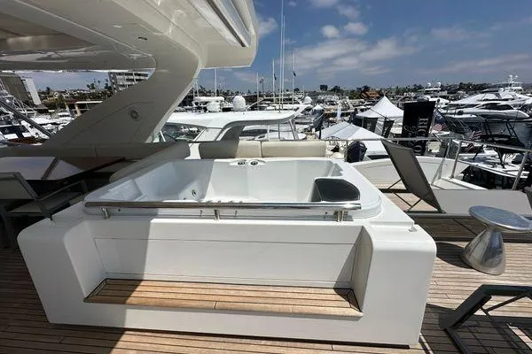  Yacht Photos Pics Luxurious 2015 Azimut 80 yacht deck with jacuzzi and sun loungers at marina.