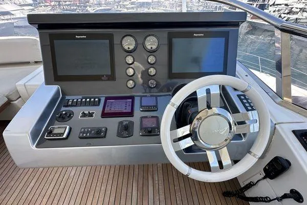  Yacht Photos Pics Helm of 2015 Azimut 80 yacht with modern navigation controls and dual displays.