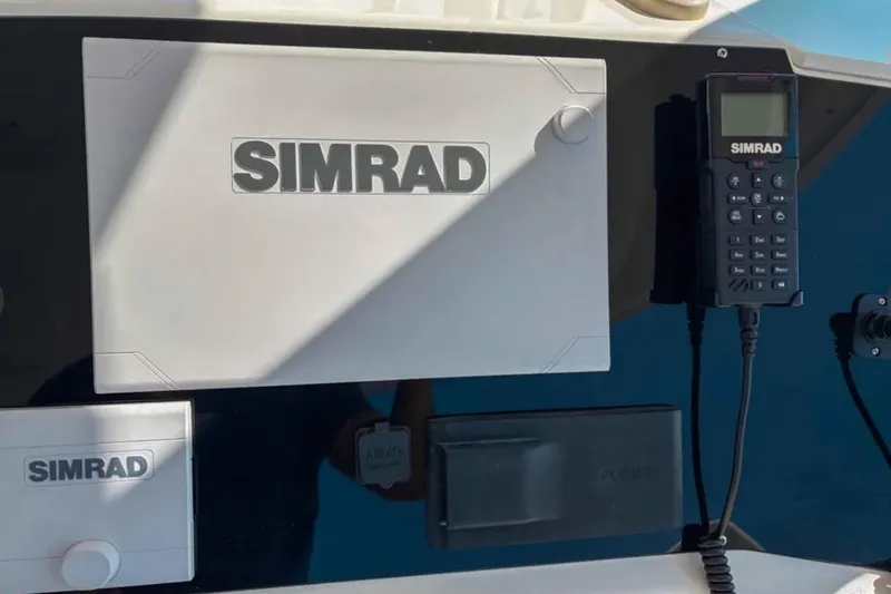  Yacht Photos Pics Simrad marine electronics on 2003 Silverton 42 Convertible boat dashboard.
