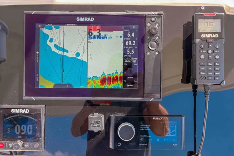  Yacht Photos Pics Simrad navigation system on 2003 Silverton 42 Convertible boat dashboard.