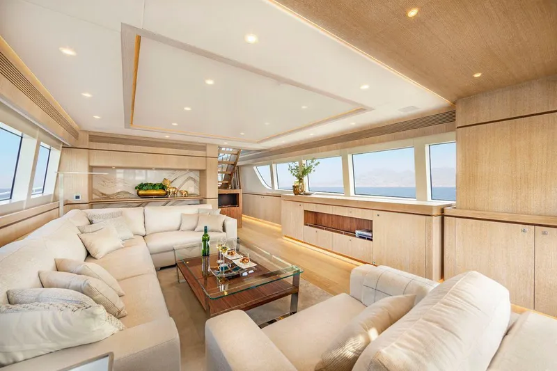  Yacht Photos Pics Luxurious interior of 2021 Van der Valk HELGA yacht with elegant seating and ocean views.