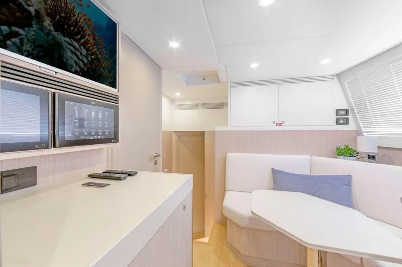  Yacht Photos Pics Modern interior of 2021 Van der Valk HELGA yacht with sleek design and cozy seating area.