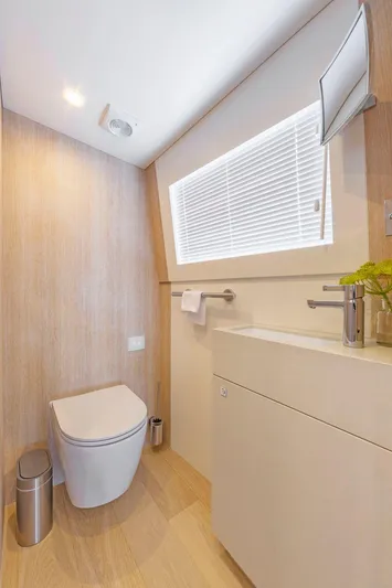  Yacht Photos Pics Modern bathroom in 2021 Van der Valk HELGA yacht with sleek fixtures and natural lighting.