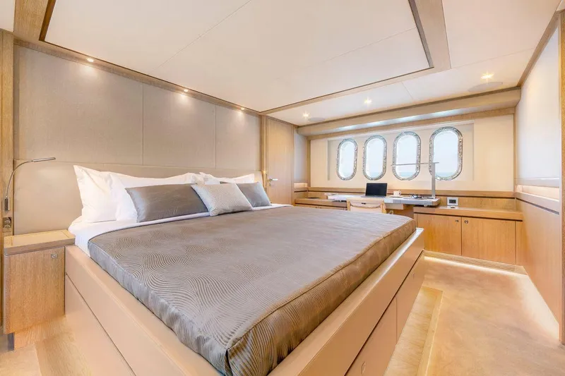  Yacht Photos Pics Luxurious bedroom interior on Van der Valk HELGA yacht, 2021 model, featuring elegant design and ample natural light.