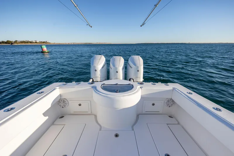  Yacht Photos Pics 2024 Onslow Bay 33 TE boat with triple engines on open water.