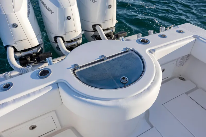  Yacht Photos Pics 2024 Onslow Bay 33 TE boat with Mercury engines and fishing rod holders.