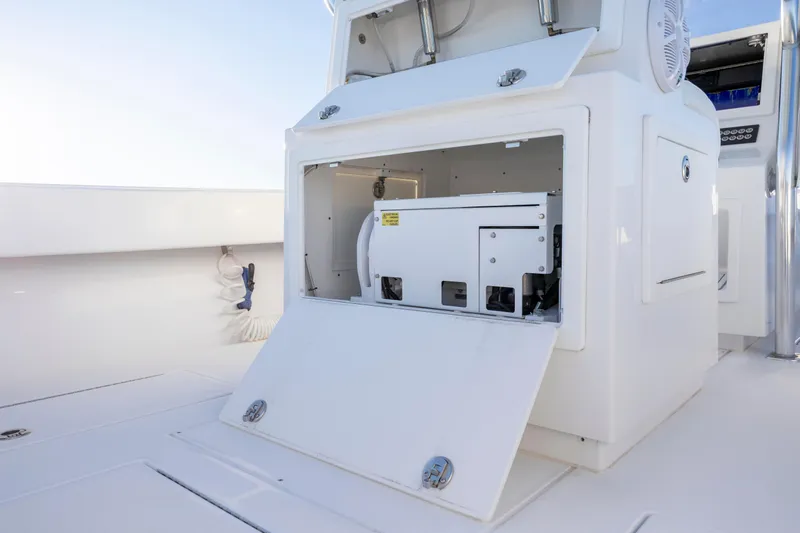  Yacht Photos Pics 2024 Onslow Bay 33 TE boat interior with open storage compartment.