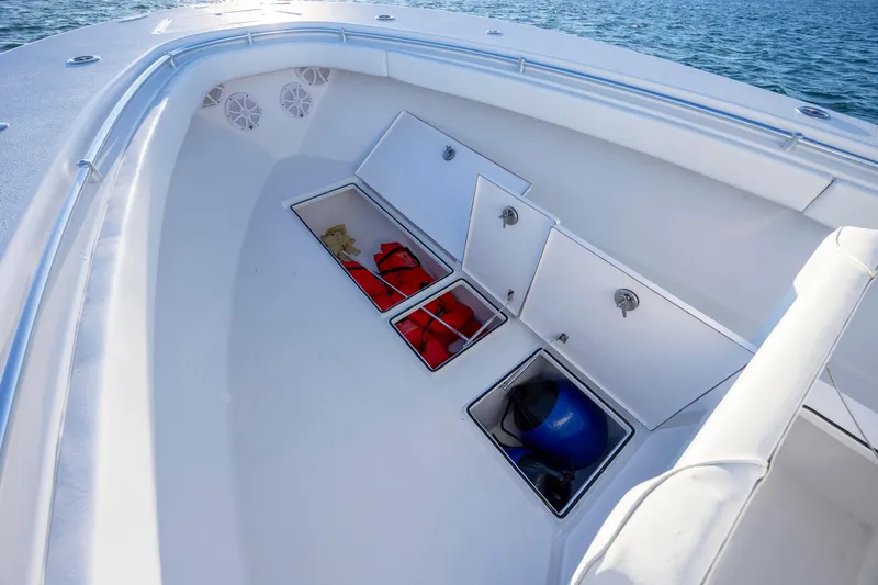  Yacht Photos Pics 2024 Onslow Bay 33 TE boat storage compartments with life jackets and equipment.