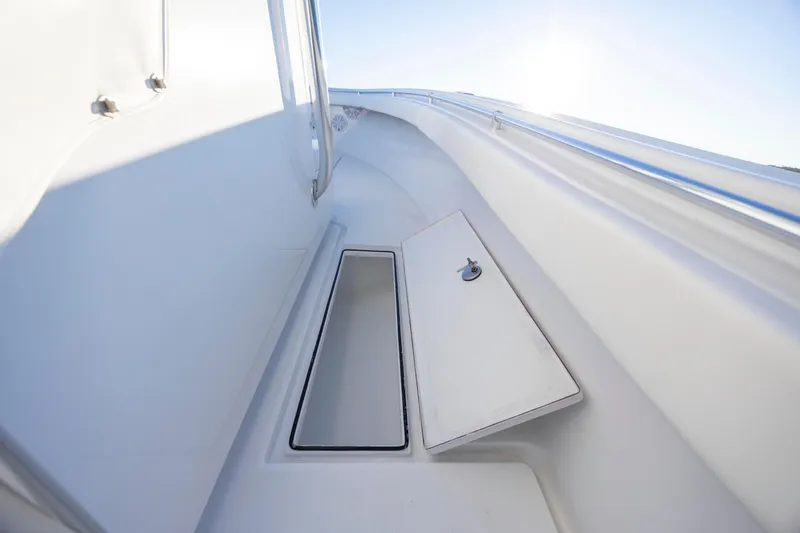  Yacht Photos Pics 2024 Onslow Bay 33 TE boat storage compartment with open hatch, showcasing sleek design.