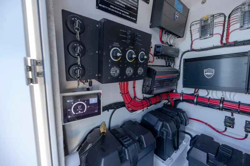  Yacht Photos Pics Electrical system of 2024 Onslow Bay 33 TE boat with control panels and wiring.