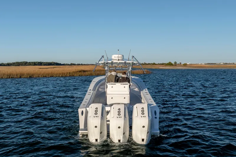  Yacht Photos Pics 2024 Onslow Bay 33 TE boat with triple 400 V10 engines on open water.