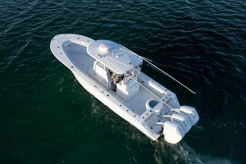  Yacht Photos Pics 2024 Onslow Bay 33 TE boat cruising on open water, aerial view.