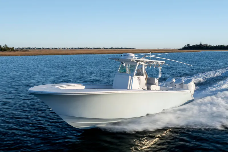  Yacht Photos Pics 2024 Onslow Bay 33 TE boat cruising on open water.