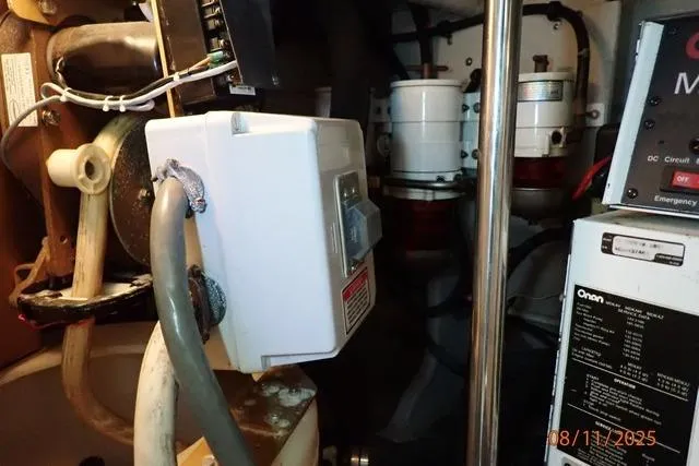  Yacht Photos Pics Engine room of 2003 Sea Ray 460 Sundancer with electrical components and wiring.