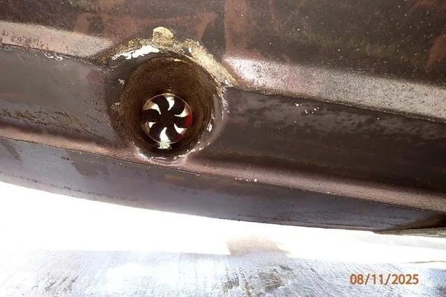  Yacht Photos Pics Close-up of a 2003 Sea Ray 460 Sundancer hull with visible thruster.